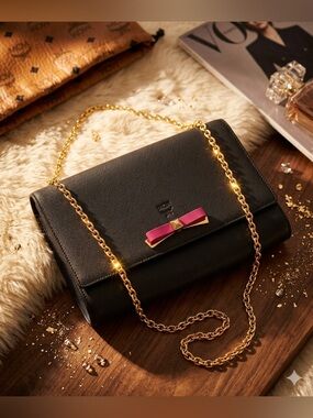 MCM Mina Crossbody/wallet on chain in black/dark gray Saffiano leather BowAccent
